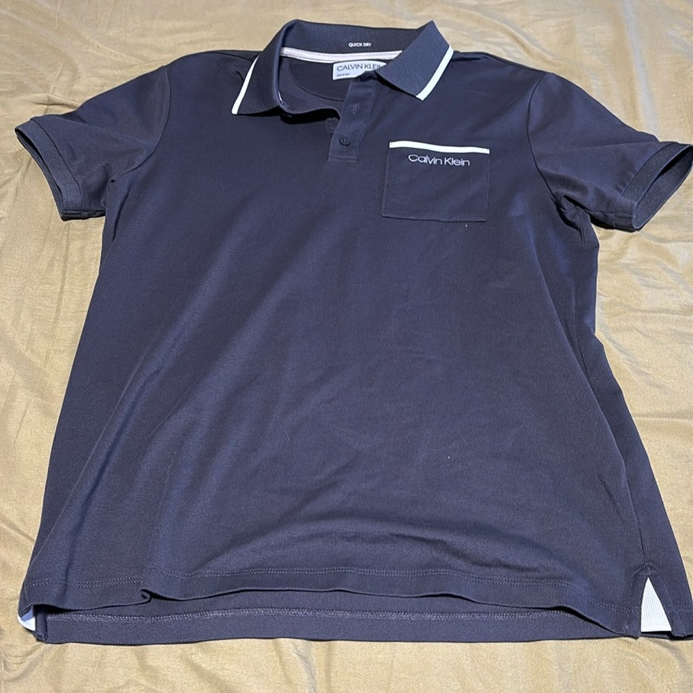 Never worn blue quick dry polo